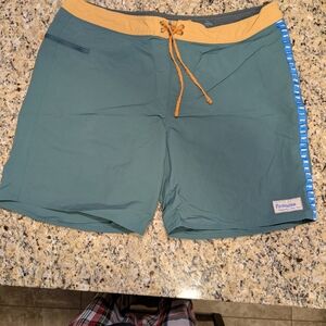 Patagonia Green Swim Shorts with Yellow Accents